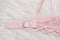 KHARKOV, UKRAINE - MARCH 04, 2019: Label of pink lace bra Victoriaâ€™s Secret. Lingerie concept. Close up