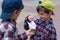 KHMELNITSKY, UKRAINE - JULY 29, 2017: Boy holds an origami pigeon in his hands.