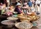 Khmer woman selling seafood at traditional food marketplace