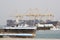 Khor Fakkan UAE old wooden dhow washed up on shore in front of Khor Fakkport