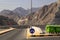 Khorfakkan mountain, road sign, garbage containers