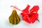 Khoya Modak with red hibiscus flower, an Indian traditional sweet