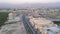 Khuzam road in Ras al Khaimah emirate in the UAE with aerial cityscape skyline view