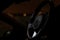 Kia sportage suv steering wheel glory shot in black at sunset aesthetic shot