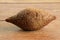 Kibbeh. Brazilian snack on the wooden table. Isolated