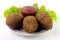 Kibbeh on the plate, traditional Lebanese cuisine food, isolated on white background