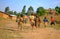 Kibuye/Rwanda - 08/25/2016: Group of african pygmy tribe children running and having fun in ethnic village