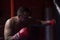 Kick boxer training on a punching bag