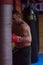 Kick boxer training on a punching bag