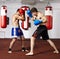 Kickbox fighters sparring in the gym