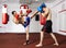 Kickbox fighters sparring in the gym