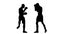 Kickboxers are training kicked in the head. Black silhouette