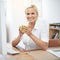 Kickstarting the workday with a strong cup of coffee. Portrait of a businesswoman drinking coffee while working at her