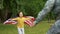 Kid with american flag hugging father in uniform, family togetherness patriotism