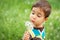 Kid blowing dandelions