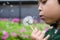 Kid boy blowing dandelions