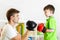 Kid boy and father play boxing