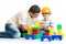 Kid boy and father play builders