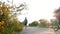 Kid boy and girl in uniform walking and riding bicycle to school in morning.