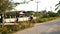 Kid boy and girl in uniform walking and riding bicycle to school in morning.