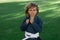 Kid boy practicing martial arts outdoor. Sport karate kids. Little boy wearing kimono doing karate in park. Child