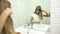 Kid Brushing Hair in Mirror, Child Hair Dressed in Bathroom, Blonde Girl Combing, Hairstyle