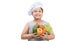 Kid chef smaile and holding vegetables isolated