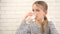 Kid drinking water in kitchen, thirsty teenager girl studying glass of fresh water, children healthcare