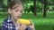 Kid Eating Boiled Corn Outdoor in Park, Girl Eats Healthy Snack Food, Child