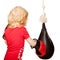 Kid exercising punching bag