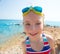 Kid funny girl wide angle beach portrait swimsuit and goggles