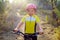 Kid girl biker in mountain bike MTB