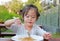 Kid girl eating Japanese yakisoba noodles
