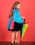 Kid girl happy hold colorful umbrella wear waterproof cloak. Enjoy rainy weather with proper garments. Waterproof