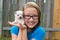 Kid girl with puppy pet chihuahua playing happy