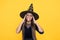 Kid goes to wizard school. witchcraft and enchantment. childhood autumn holiday. girl ready to celebrate. costume party