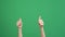 Kid hand pointing at someone, rising up and show gesturing two hands thumbs up on green screen background