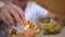 Kid Hand Takes Chips, Crackers from a Plate. Dining with Harmful Snack Foods