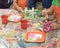 Kid hands painting craft at building workshop in local hardware store in Texas, USA