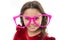 Kid happy wear cute eyeglasses accessory. Child charming smile isolated white background. Girl wear big funny eyeglasses