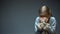 Kid hiding behind teddy bear, childish phobia and fear, family violence victim