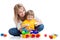 Kid with his mom play building blocks toys