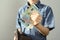 Kid holds euro banknotes and black wallet in his hand, concept of pocket money, theft, shopping