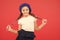 Kid little cute fashion girl posing with long braids and hat red background. Fashion girl. Fashionable beret accessory