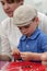 Kid making bracelet