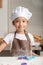 The kid making homemade bakery with happiness