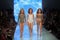 Kid models walk the runway during the Tori Praver Swimwear 2020 Runway Show