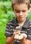 Kid observing snail