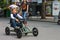 Kid in the play area riding a toy car. Nikolaev, Ukraine