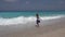 Kid Playing on Beach, Child Running in Sea Waves, Girl Watching Blue Waves on Coastline in Summer Vacation